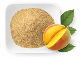 African mango seed powder beside a mango slice